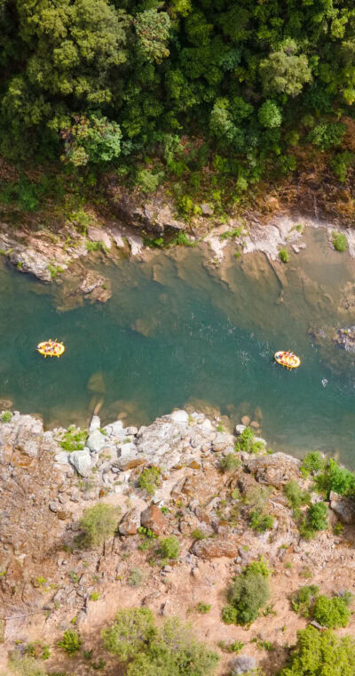 Groups rafting down the American River.