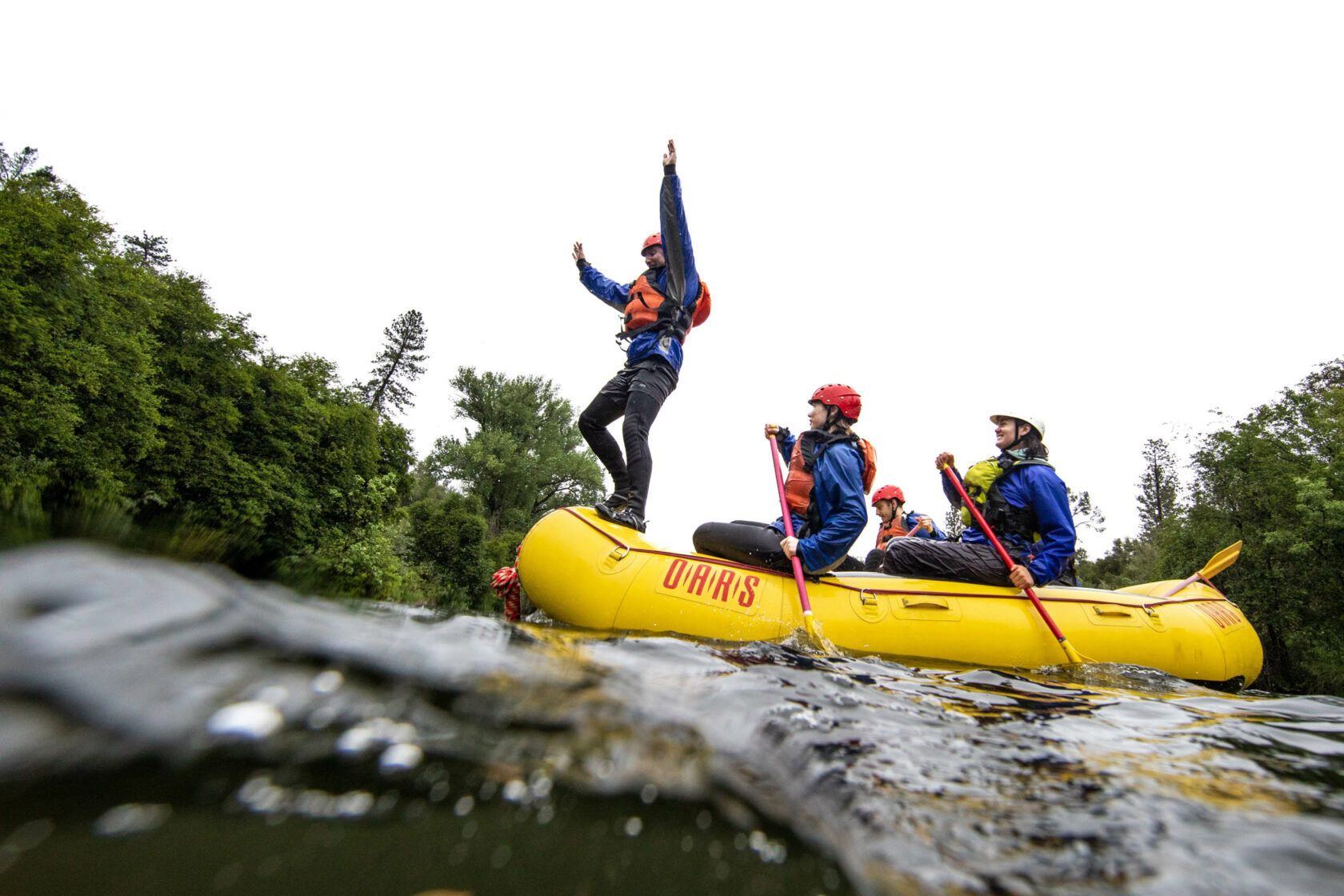 Guides on a raft in the whitewater guide school.