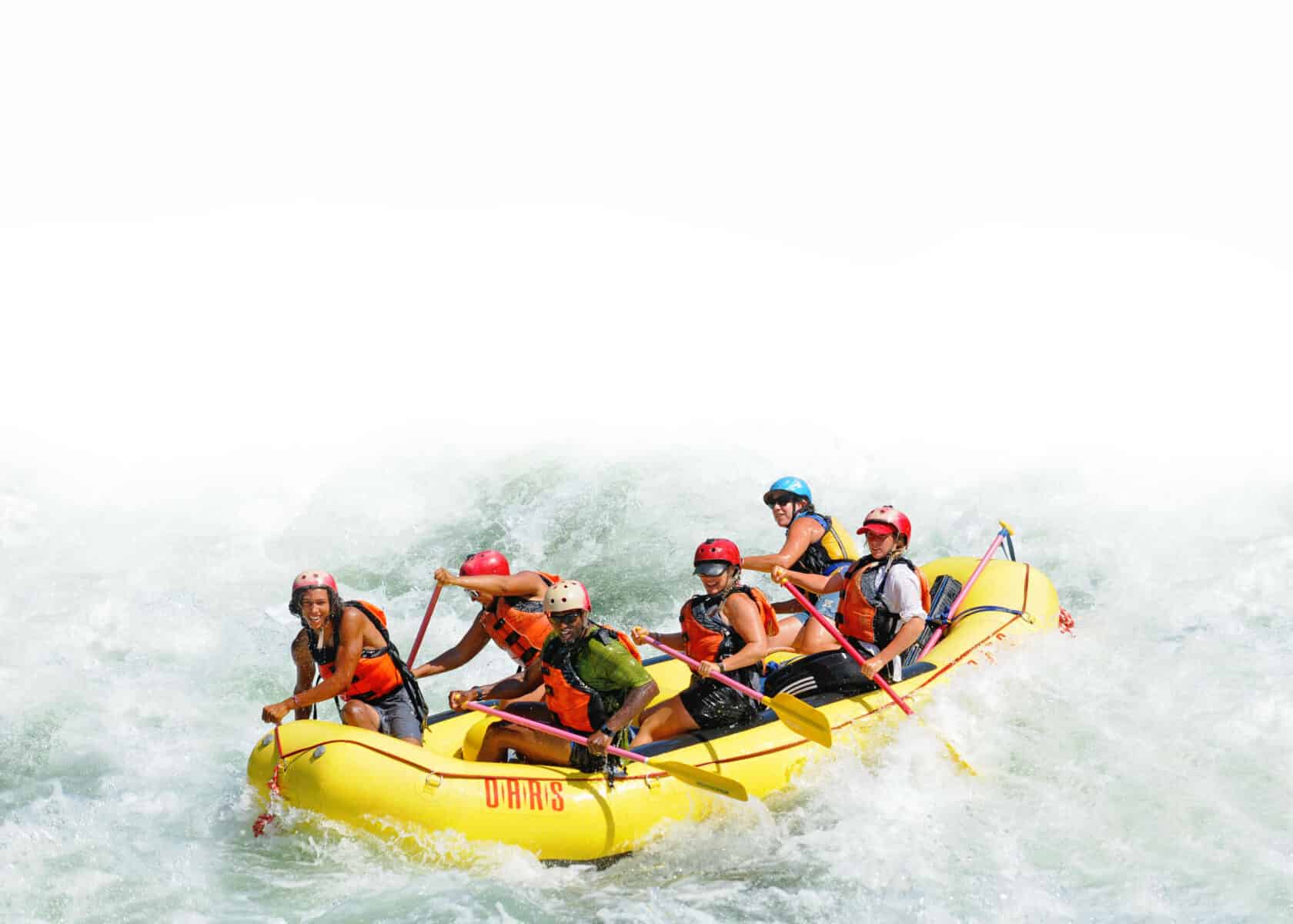 Group rafting on rapids.