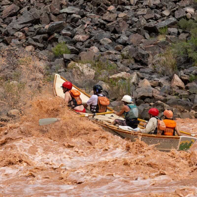 A dory runs a rapid in Grand Canyon